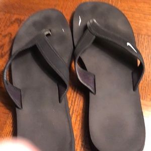 Like new Nike flip flops